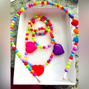 3 PIECE SET MULTI COLORED BEADED NECKLACE, BRACELET AND HEAD BAND SET.